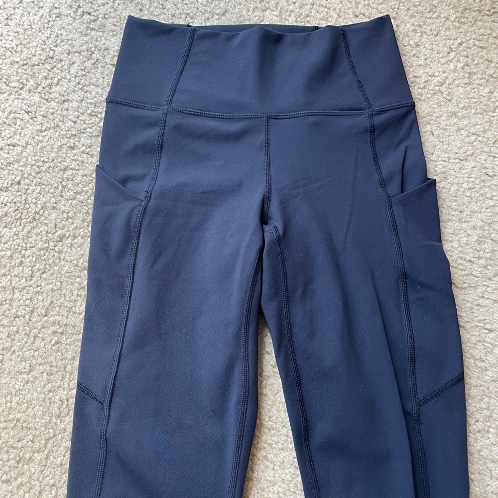 Fabletics, navy blue leggings with pockets